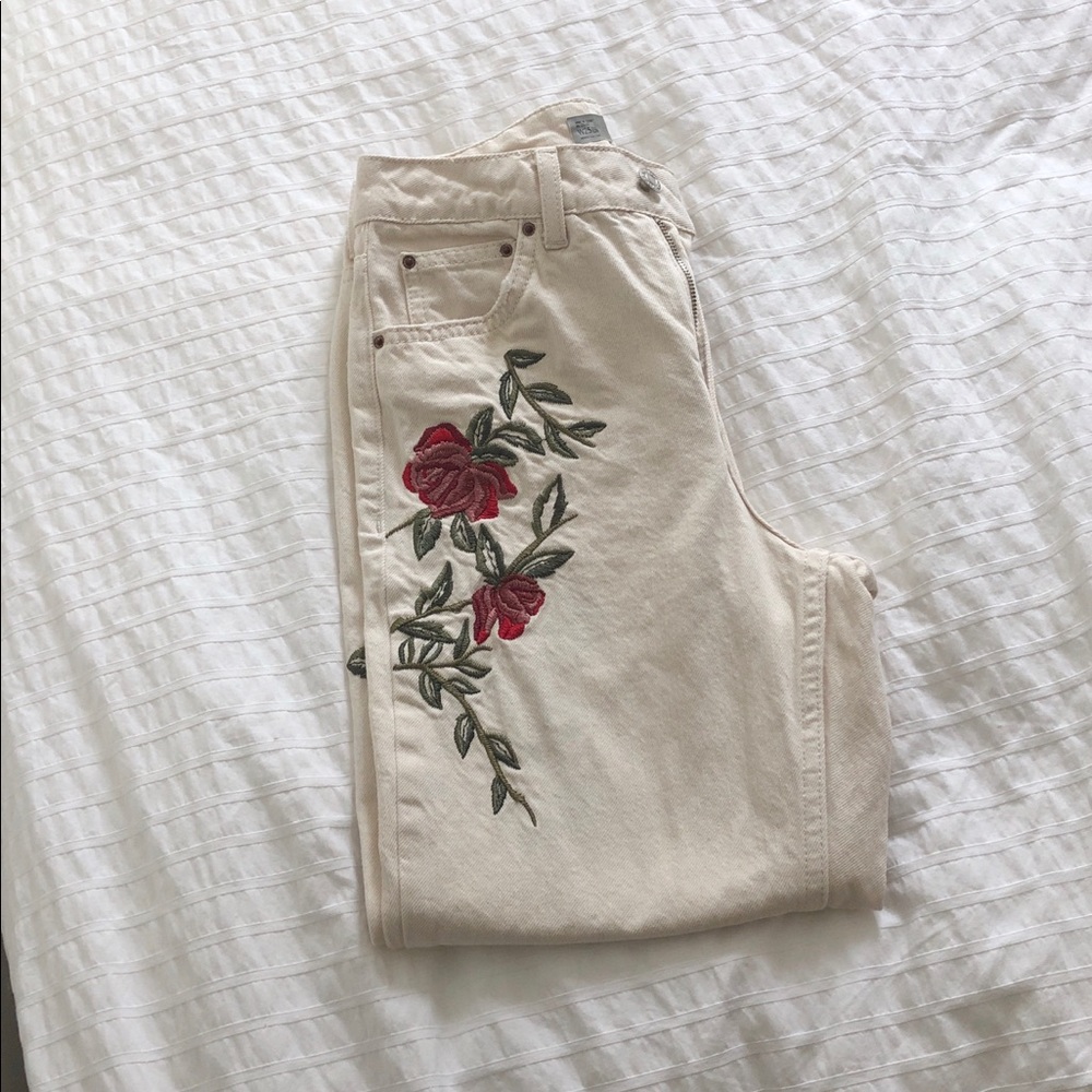Rose embroidered white jeans